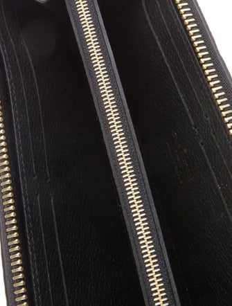 Louis Vuitton LV Monogram Empreinte Leather Clemence Wallet