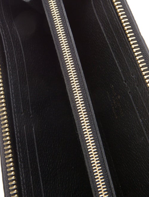 Louis Vuitton LV Monogram Empreinte Leather Clemence Wallet