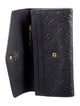 Louis Vuitton LV Monogram Empreinte Leather Curieuse Wallet