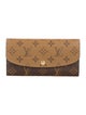 Louis Vuitton Coated Canvas Emilie Wallet