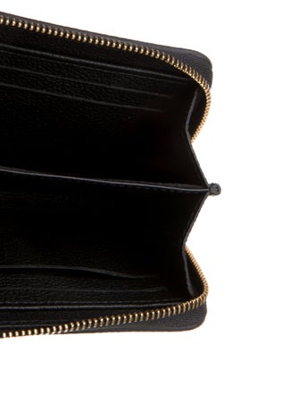 Louis Vuitton LV Monogram Empreinte Leather Zippy Coin Purse