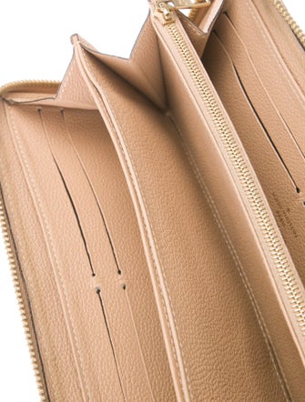 Louis Vuitton LV Monogram Empreinte Leather Zippy Wallet