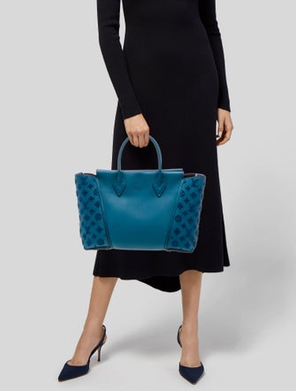 Louis Vuitton Leather Weekender Bag PM