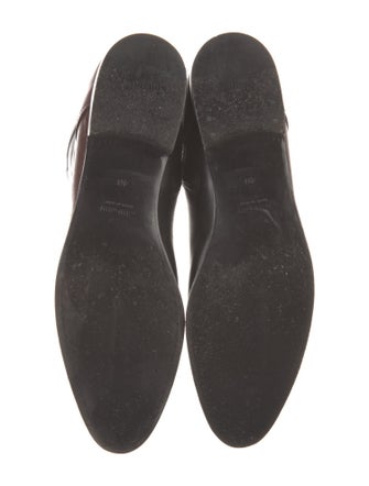 Miu Miu Leather Printed Riding Boots