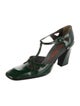 Miu Miu Patent Leather Cutout Accent T-Strap Pumps