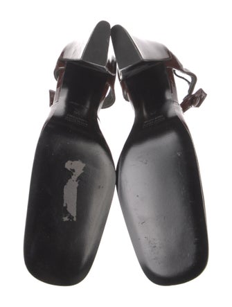 Miu Miu Patent Leather Cutout Accent T-Strap Pumps