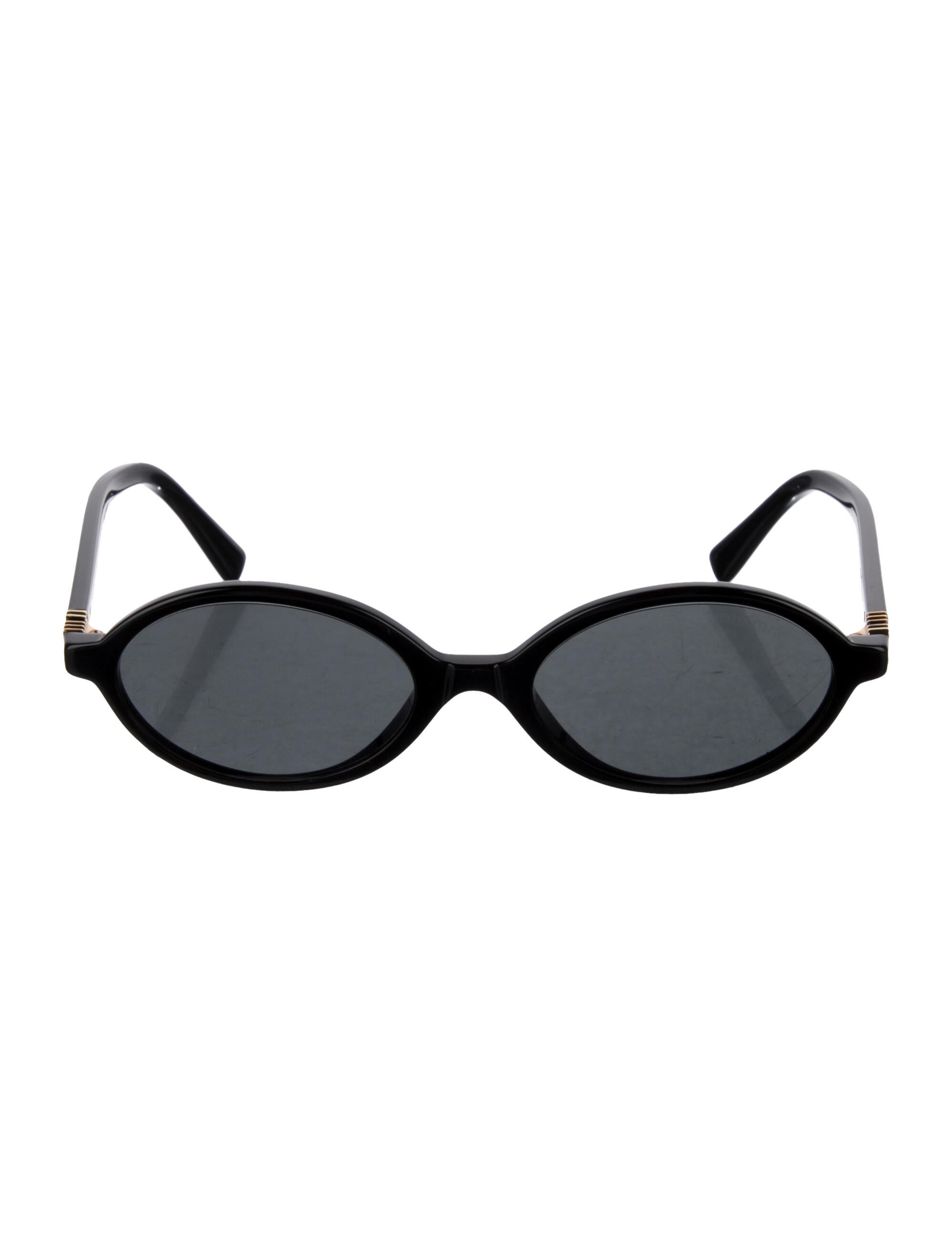 Miu Miu Round Tinted Sunglasses