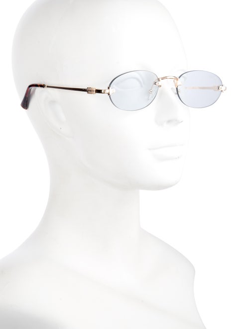 Miu Miu Round Tinted Sunglasses