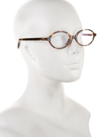 Miu Miu Round Eyeglasses