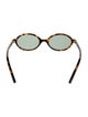 Miu Miu Oversize Tinted Sunglasses