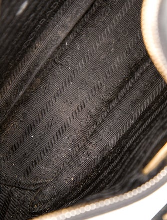 Prada Enameled Metal Triangle Re-Edition 2005