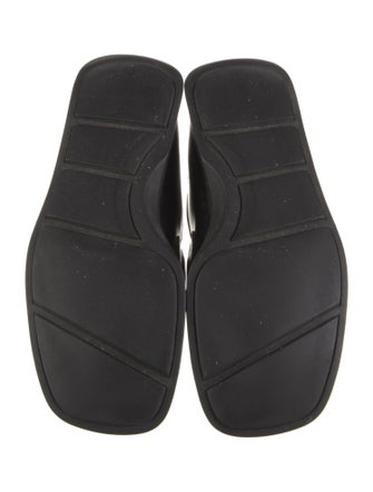 Prada Enameled Metal Triangle Leather Loafers