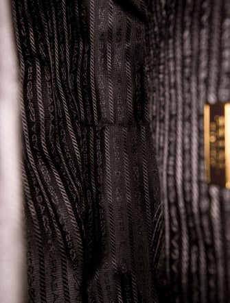 Prada Enameled Metal Triangle Weekender Bag