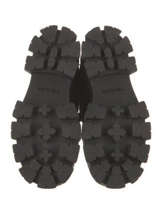 Prada Enameled Metal Triangle Leather Combat Boots