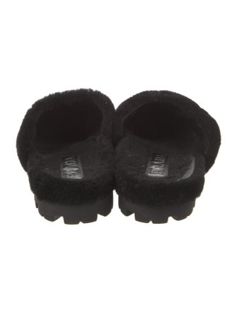 Prada Enameled Metal Triangle Shearling Slides