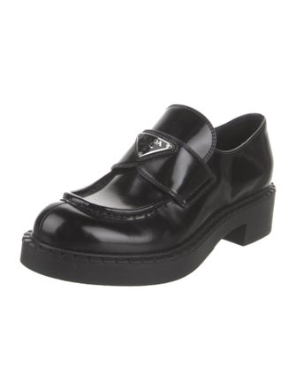 Prada Enameled Metal Triangle Leather Loafers