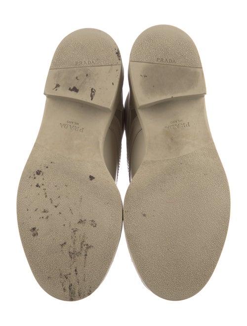 Prada Enameled Metal Triangle Leather Combat Boots