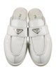 Prada Enameled Metal Triangle Leather Mules