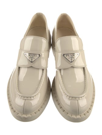 Prada Enameled Metal Triangle Patent Leather Loafers
