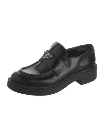 Prada Enameled Metal Triangle Leather Loafers