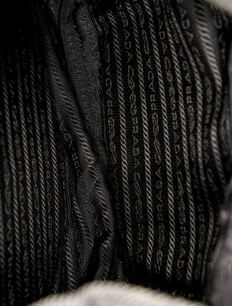 Prada Enameled Metal Triangle Backpack