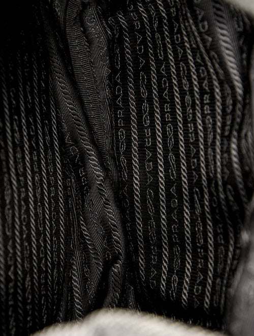 Prada Enameled Metal Triangle Backpack