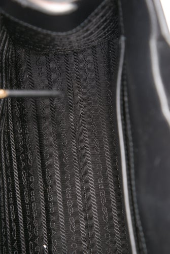 Prada Enameled Metal Triangle Symbole Small