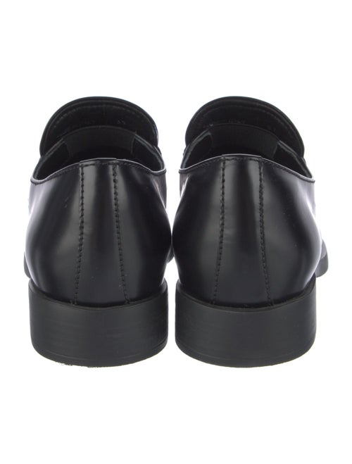 Prada Enameled Metal Triangle Leather Loafers