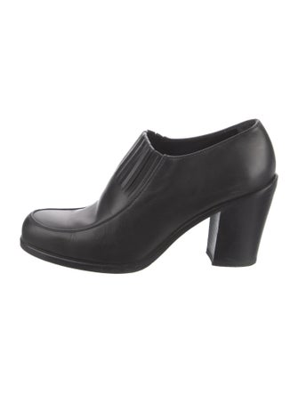 Prada Enameled Metal Triangle Leather Pumps