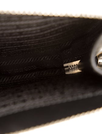 Prada Enameled Metal Triangle Backpack