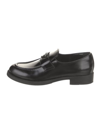 Prada Enameled Metal Triangle Patent Leather Loafers