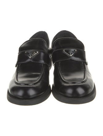 Prada Enameled Metal Triangle Patent Leather Loafers