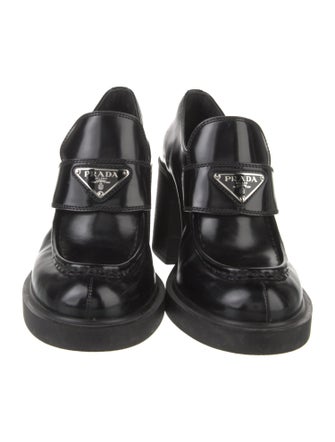 Prada Enameled Metal Triangle Leather Pumps