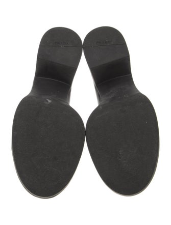 Prada Enameled Metal Triangle Leather Pumps