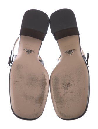 Prada Enameled Metal Triangle Patent Leather Slingback Pumps