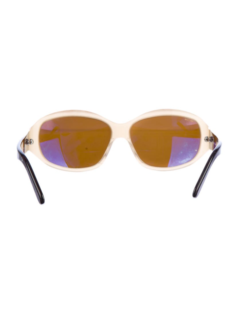 prada sunglasses with swirl on side