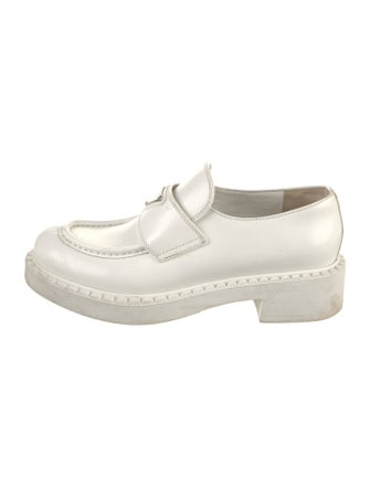 Prada Enameled Metal Triangle Leather Loafers