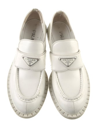 Prada Enameled Metal Triangle Leather Loafers