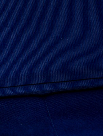 Prada Enameled Metal Triangle Canapa