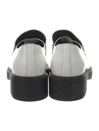Prada Enameled Metal Triangle Leather Loafers