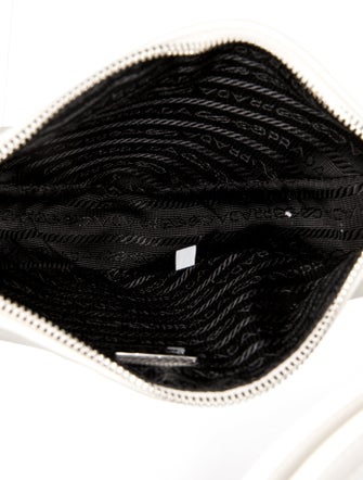 Prada Enameled Metal Triangle Triangle