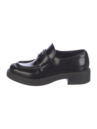 Prada Enameled Metal Triangle Patent Leather Loafers