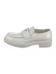 Prada Enameled Metal Triangle Leather Loafers