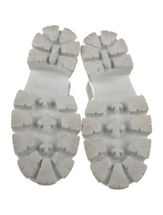 Prada Enameled Metal Triangle Rubber Slingback Sandals