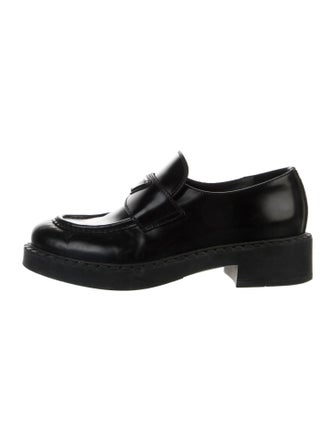 Prada Enameled Metal Triangle Leather Loafers