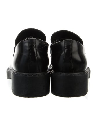 Prada Enameled Metal Triangle Leather Loafers