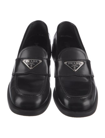 Prada Enameled Metal Triangle Leather Loafers