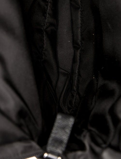 Prada Enameled Metal Triangle Backpack