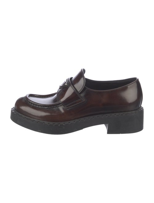 Prada Enameled Metal Triangle Patent Leather Loafers