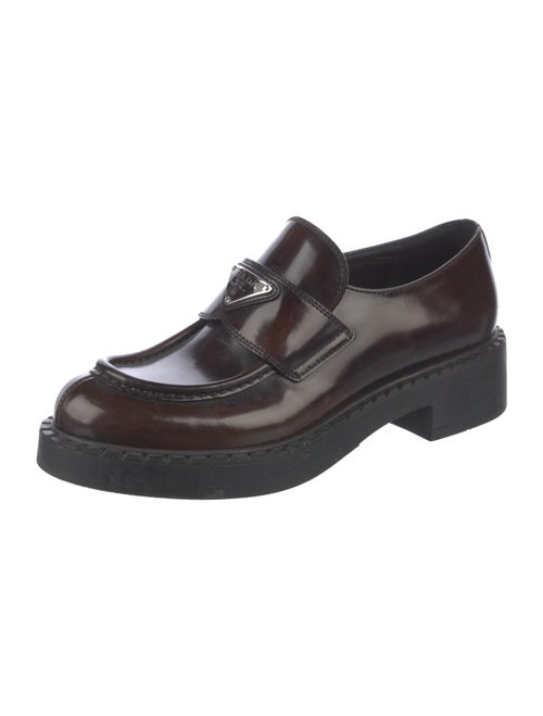 Prada Enameled Metal Triangle Patent Leather Loafers
